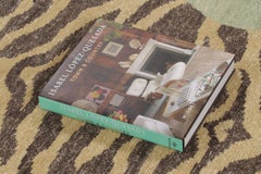 Rug & Kilim’s Distressed Tiger Rug in Green with Beige and Brown Pictorial