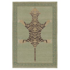 Rug & Kilim’s Distressed Tiger Rug in Green with Beige and Brown Pictorial