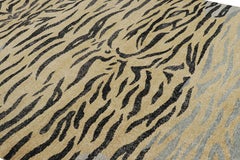 Rug & Kilim’s Distressed Tiger Skin Rug in Gold, Black and Gray Tones