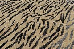 Rug & Kilim’s Distressed Tiger Skin Rug in Gold, Black and Gray Tones