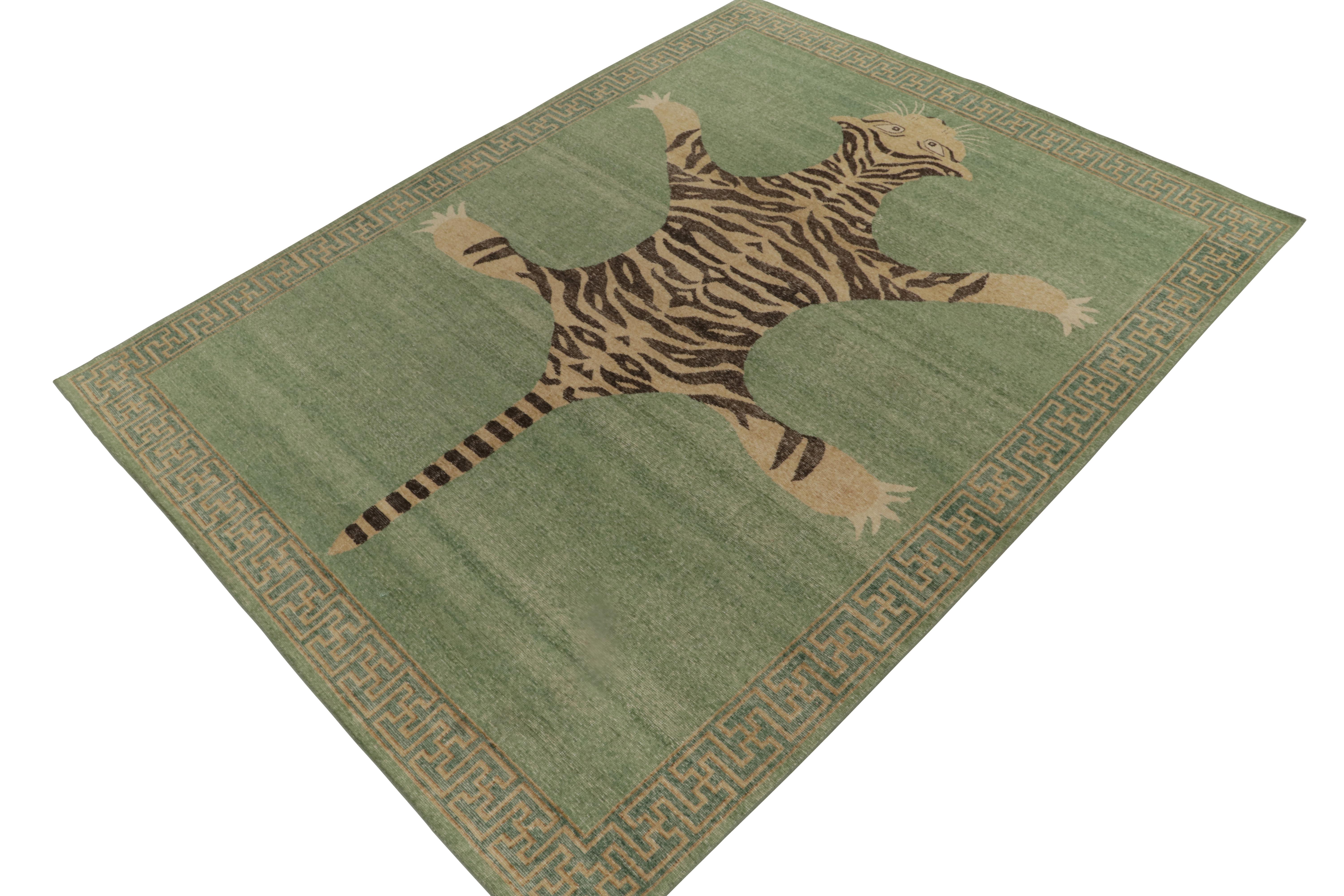 De la collection Homage de Rug & Kilim, une pièce en laine nouée à la main de 9x12 qui reprend le tapis en peau de tigre dans toute sa gloire. 

Sur le design : Cette pièce s'inspire d'anciens tapis indiens en peau de tigre à la présence royale et