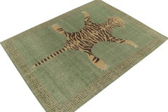 Rug & Kilim’s Distressed Tiger Skin Style Rug in Green, Beige & Black Pictorial
