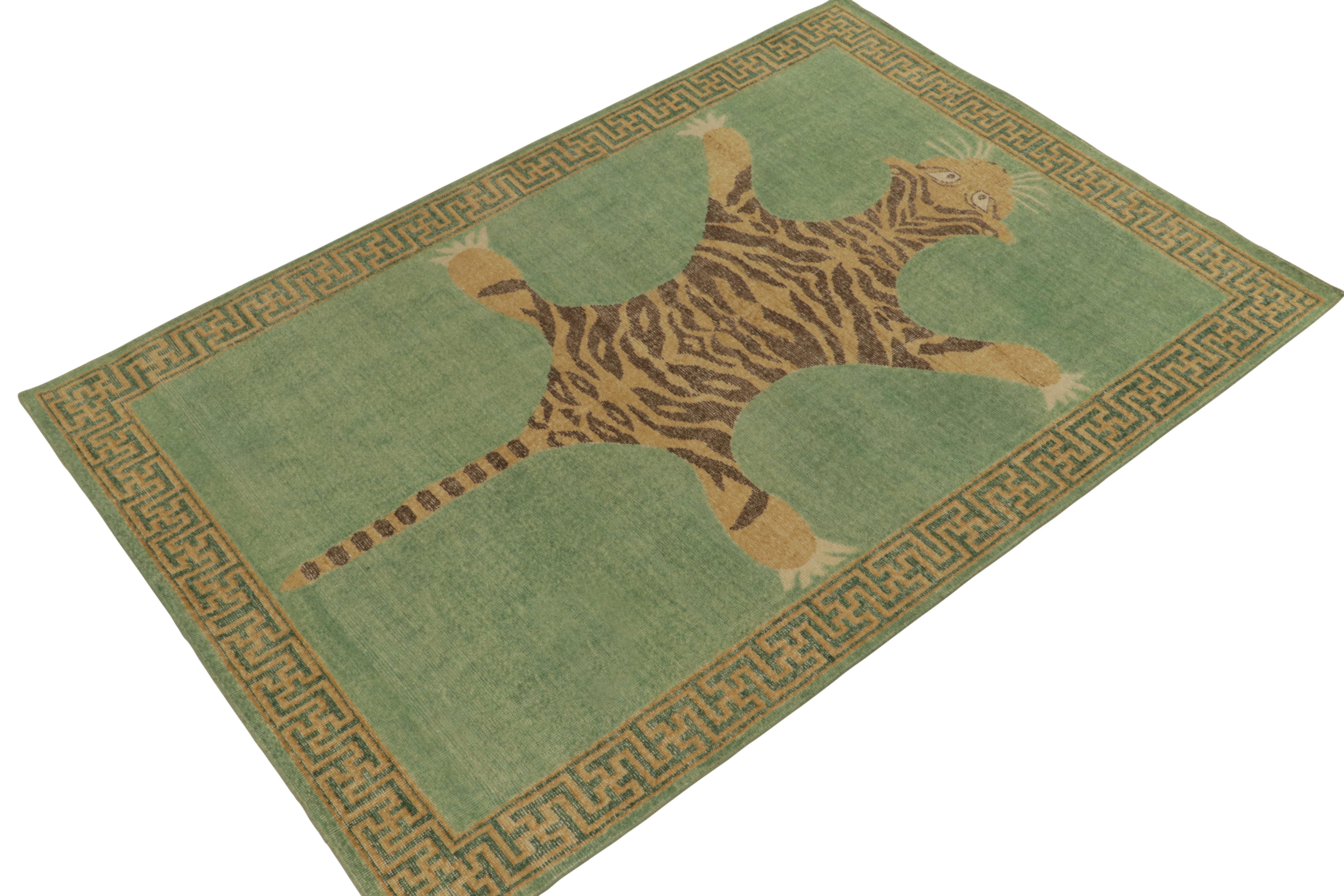 De la collection Homage de Rug & Kilim, une pièce de 6x9 en laine nouée à la main qui reprend le tapis en peau de tigre dans toute sa gloire. 

Sur le design : Cette pièce s'inspire d'anciens tapis indiens en peau de tigre à la présence royale et