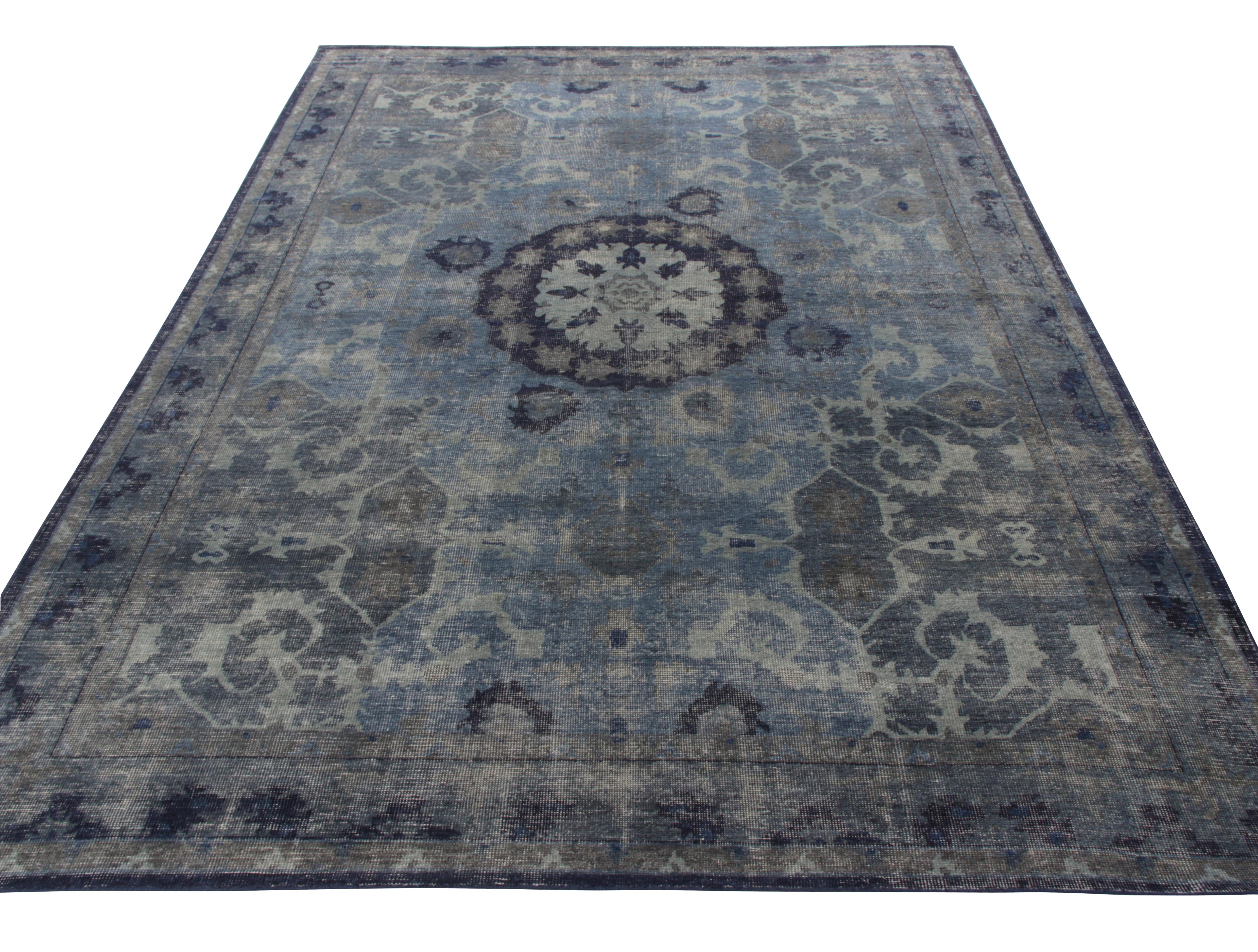 A gorgeous 10x14 hand-knotted rug in distressed style from Rug & Kilim’s Homage Collection. Inspired from classic oriental style, the rug features a striking medallion pattern surrounded by a subtle floral design in gorgeous colors of blue and gray