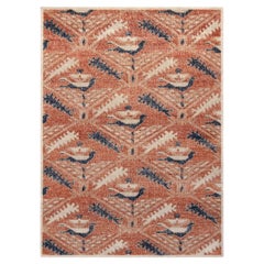 Rug & Kilim è un tappeto personalizzato in stile tribale, con motivo geometrico rosso e blu.