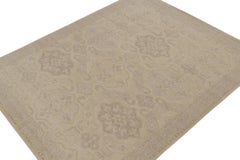 Rug & Kilim’s Distressed Tribal style rug in Beige and Gray Geometric Pattern