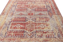 Rug & Kilim’s Distressed Tribal Style Rug in Blue, Red Geometric Pattern