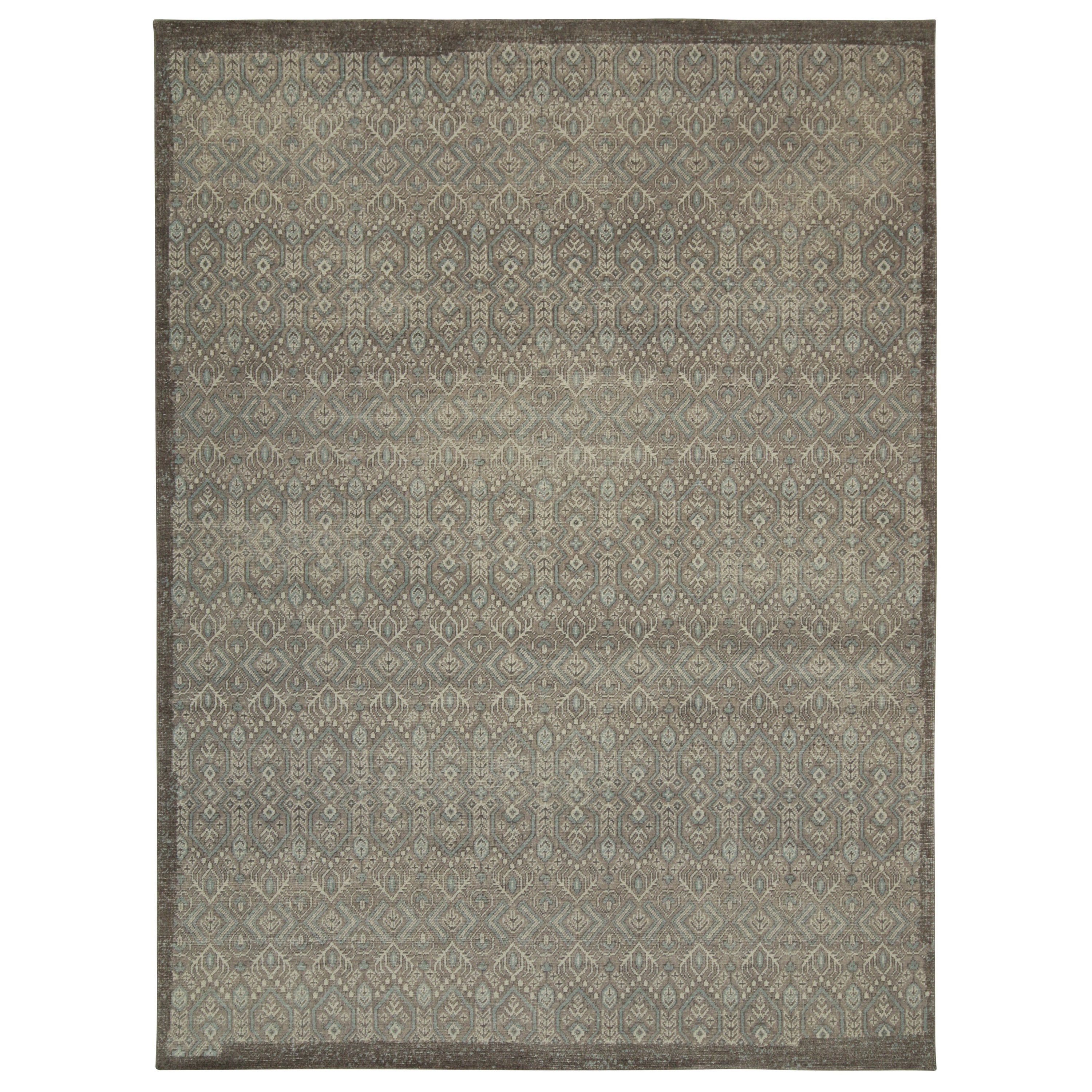 Rug & Kilim's Distressed Tribal-Teppich in Grau und Blau mit geometrischen Mustern
