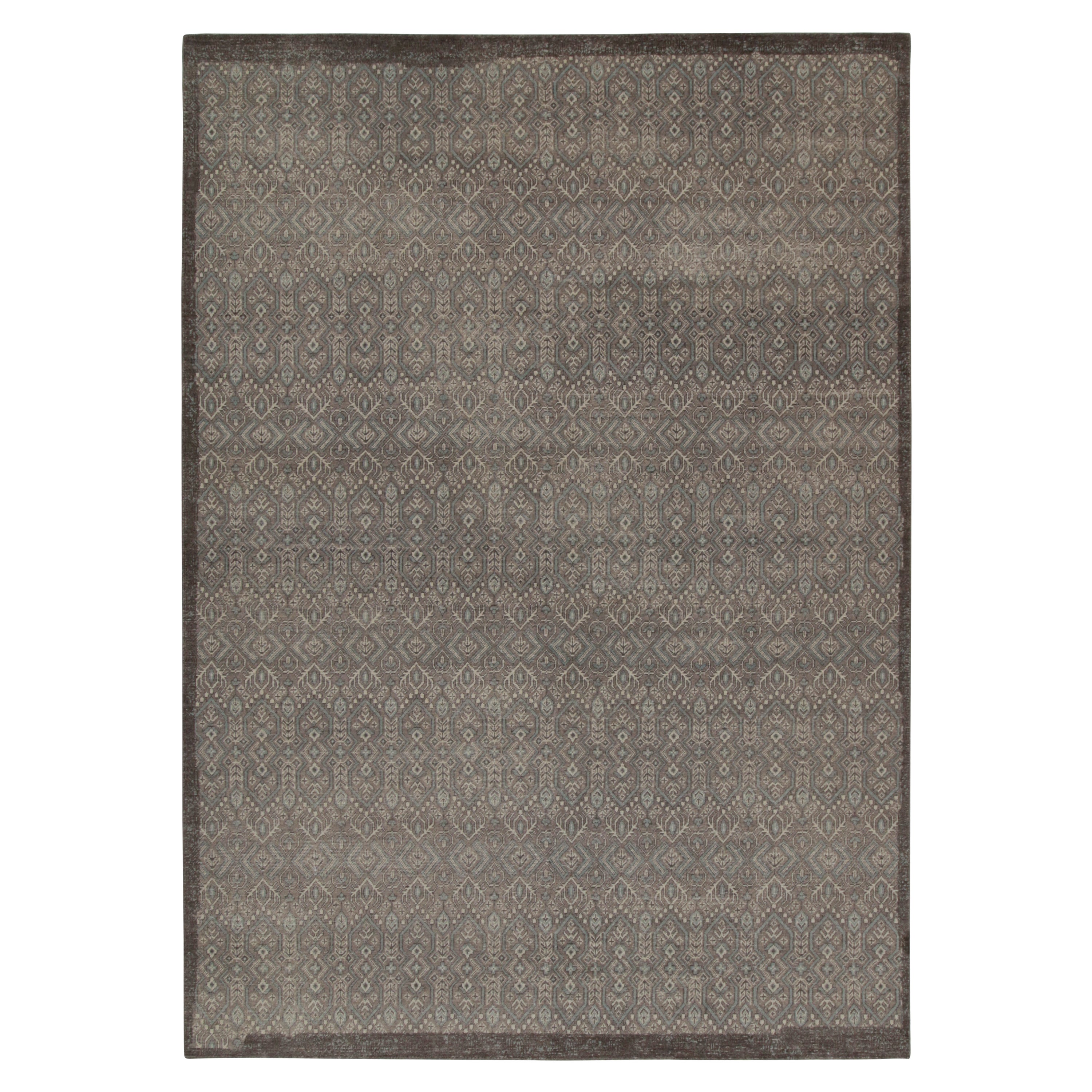 Rug & Kilim’s Distressed Tribal style rug in Gray and Blue Geometric Patterns