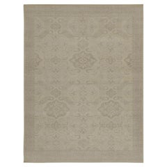 Rug & Kilim è un tappeto in stile tribale con motivi geometrici color grigio.