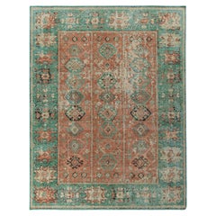 Rug & Kilim è un tappeto in stile tribale con motivo geometrico arancione e verde.
