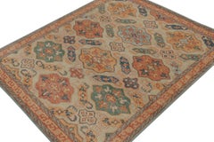 Rug & Kilim’s Distressed Tribal Style Rug in Rust and Teal Medallion Patterns