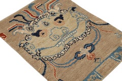 Rug & Kilim’s Dragon Scatter Rug in Beige with Orange and Blue Pictorial