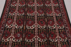 Rug & Kilim’s Ersari-Inspired Rug with Coral Red Boteh Paisley Patterns