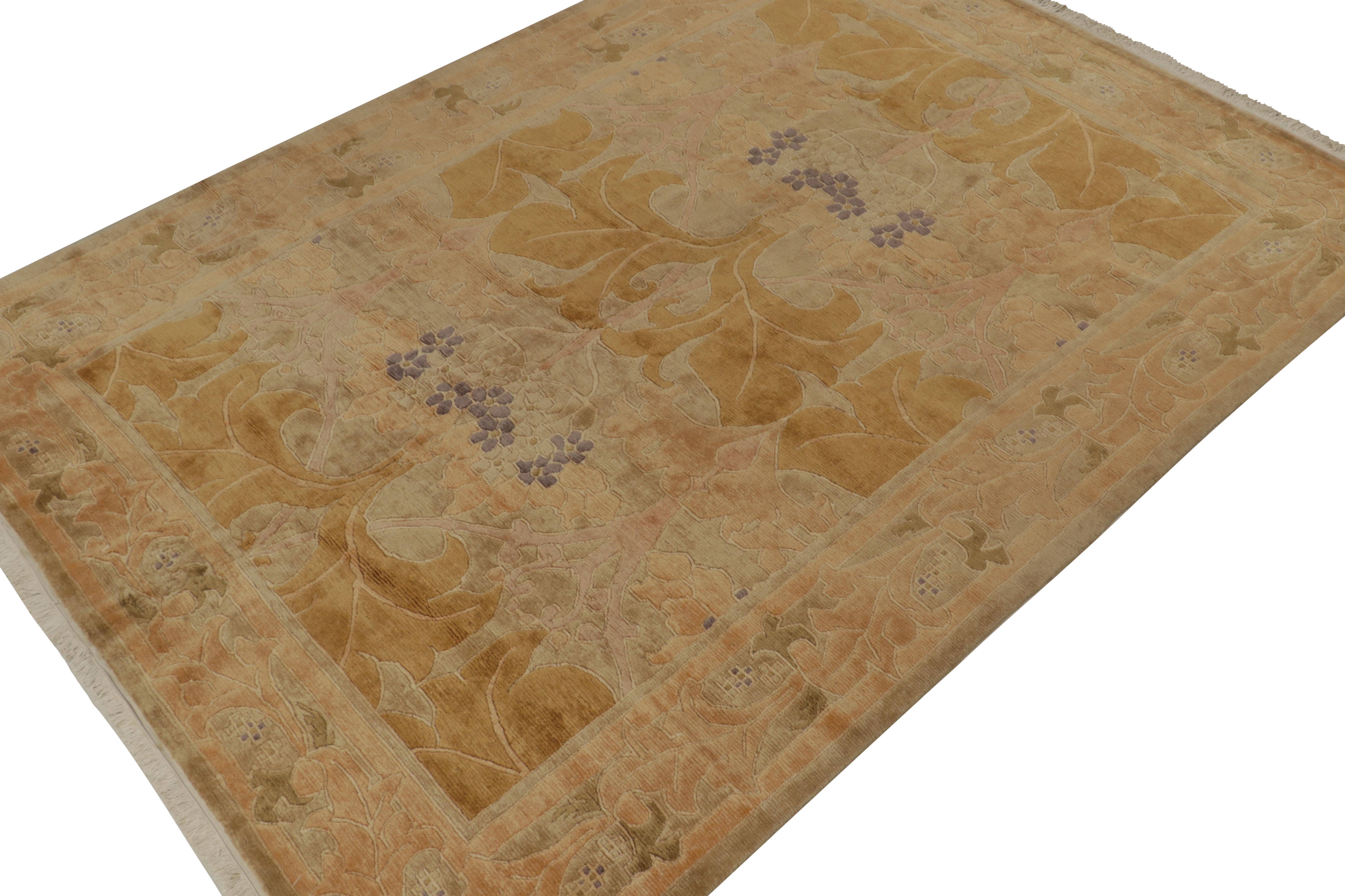 An 8x11 rug inspired from antique Art Nouveau rug styles, from Rug & Kilim’s European Collection. Hand-knotted in wool, playing a regal gold with beige and copper notes throughout elegant floral patterns. 

Further on the design:

The play of such