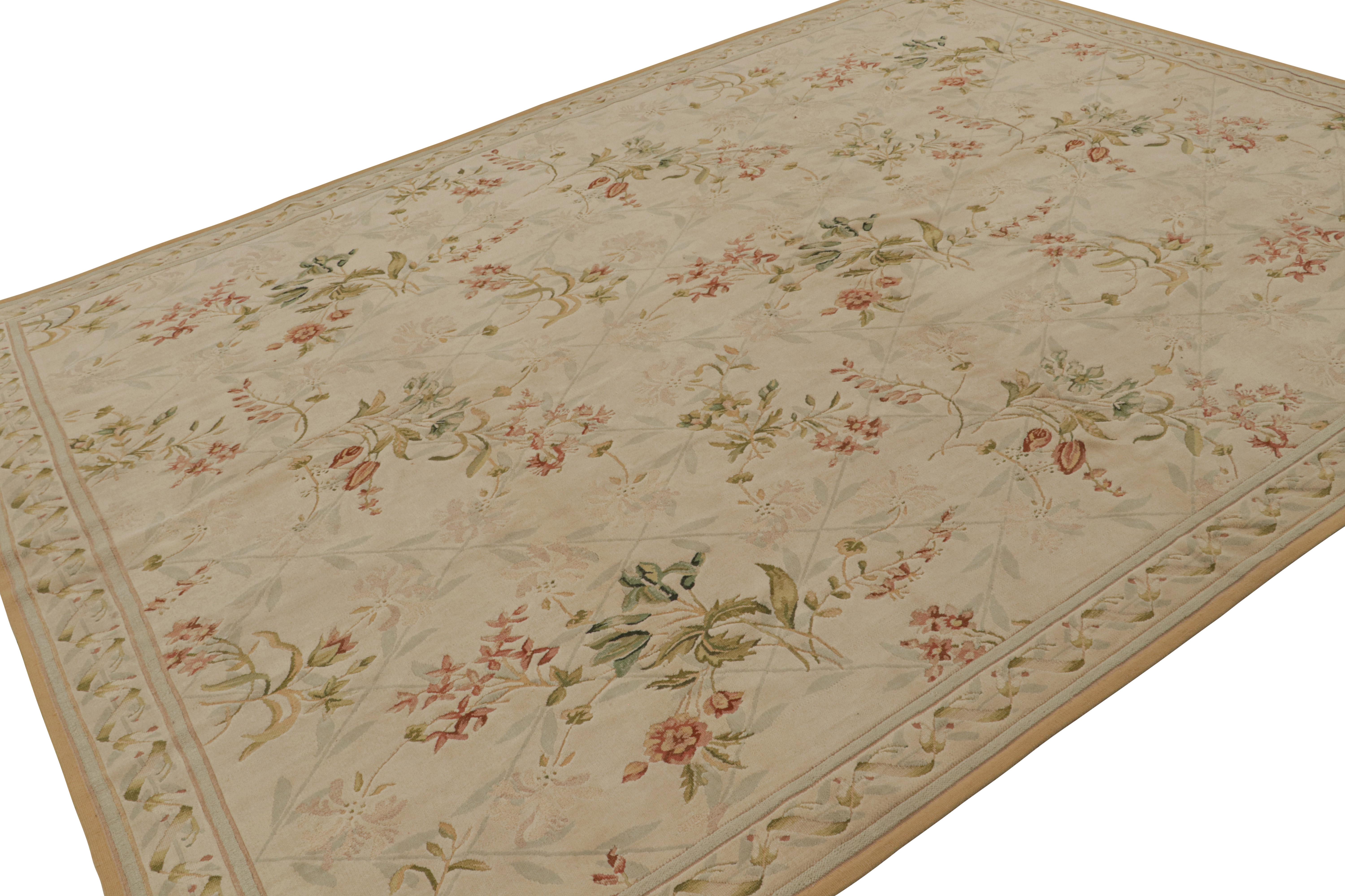 Hand-knotted in wool, this 9x12 European rug in beige is the first iteration of this design to be in high-and-low texture. Featuring green and pink floral patterns with red and cream accents, this rug is an elegant addition to the Rug & Kilim