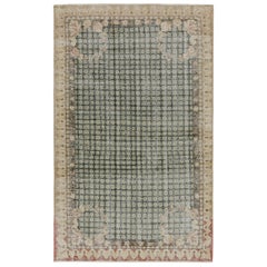 Rug & Kilim’s European-inspired, Vintage Zeki Müren Rug, with Geometric patterns