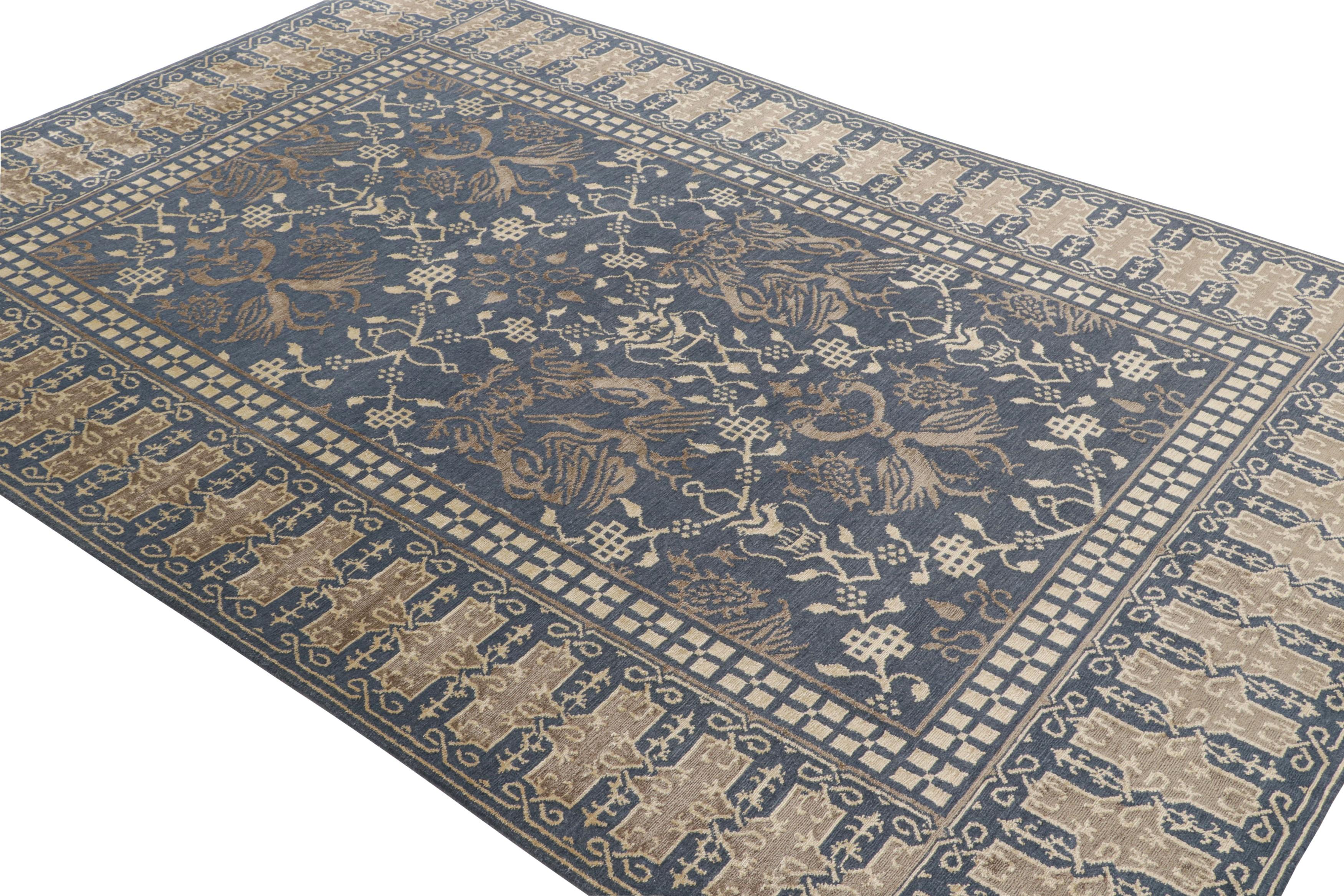 Made with hand-knotted wool and silk, this 6x9 contemporary rug joins the European Collection by Rug & Kilim—drawing inspiration from a western interpretation of traditional dragon and phoenix imagery alternating within the golden trellis patterns.