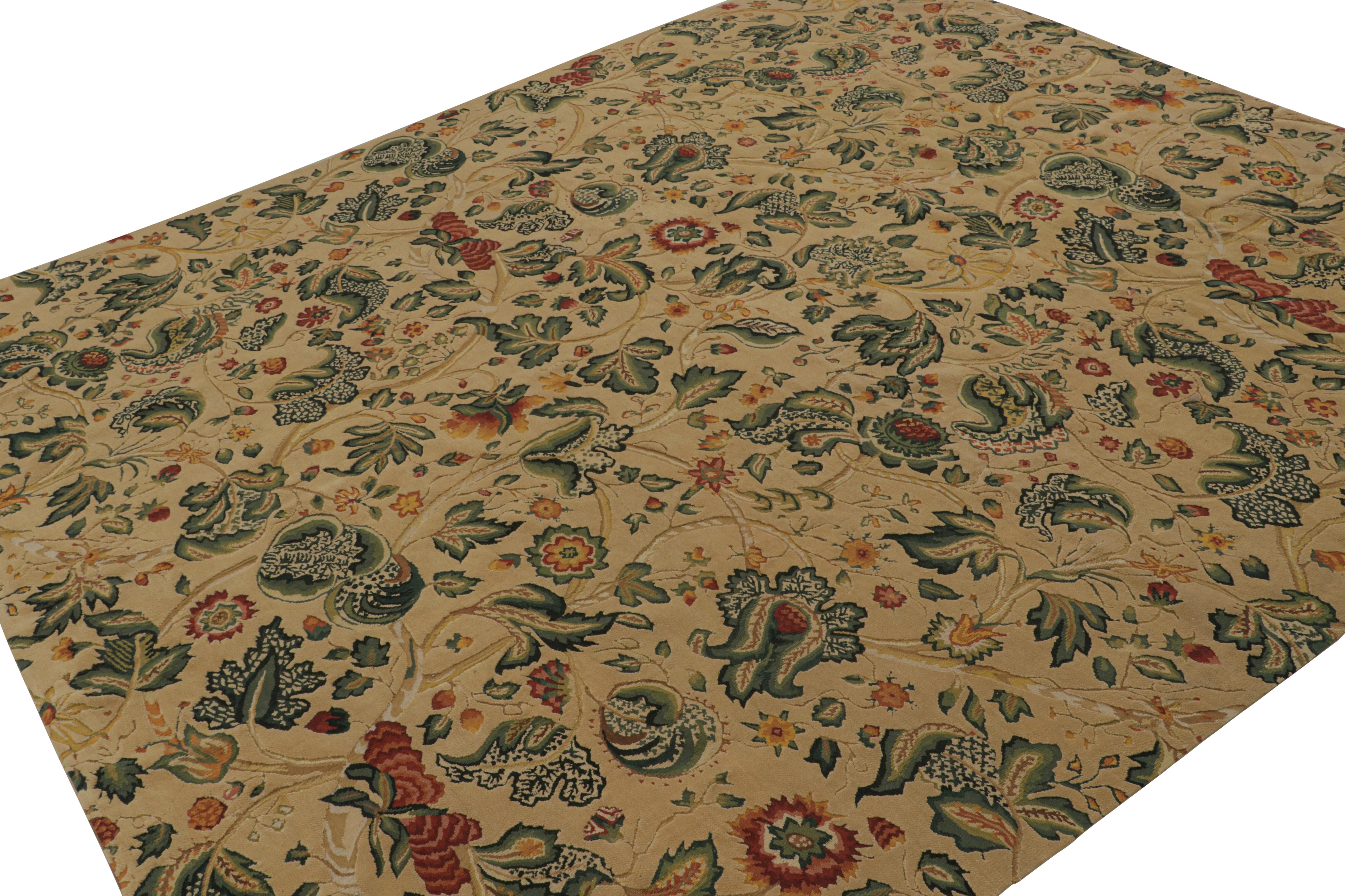 Tissé à la main en laine, ce tapis européen 9x10 à armure plate s'inspire des tapis et tapisseries Tudor anglaises du XVIIIe siècle. Le dessin présente des motifs floraux en vert, rouge, or et sarcelle sur l'ensemble du champ. 

Sur le Design :