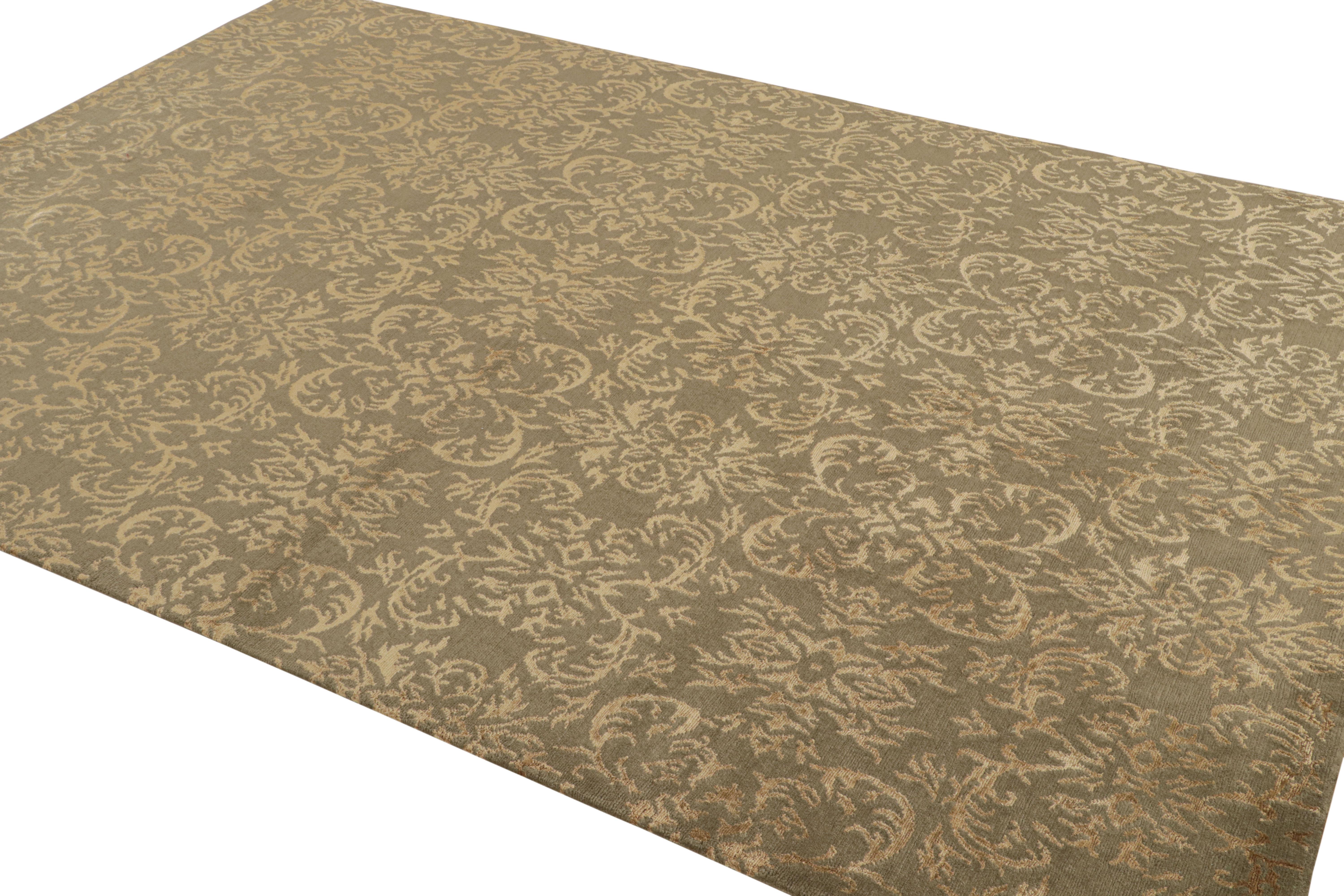 An ode to venerated Arabesque rug patterns in green and beige gold, from Rug & Kilim’s European Collection. This transitional 6x9 is hand-knotted in a unique blend of quality wool and inviting, all-natural silk. 

On the design: The silk’s natural