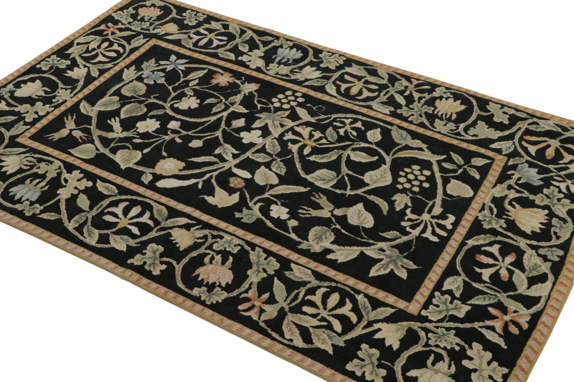 Hand-knotted in wool, this 4x6 European rug in black is the first iteration of this design to be in high-and-low texture. Featuring beige/brown, green and pink floral patterns among many other present brighter tones, this rug has been inspired by