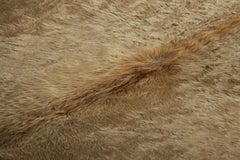 Rug & Kilim’s Extra Large Cowhide Rug in Beige-Brown and Cream Tones