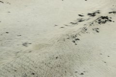 Rug & Kilim’s Extra Large Cowhide Rug in Black, White and Cream Tones