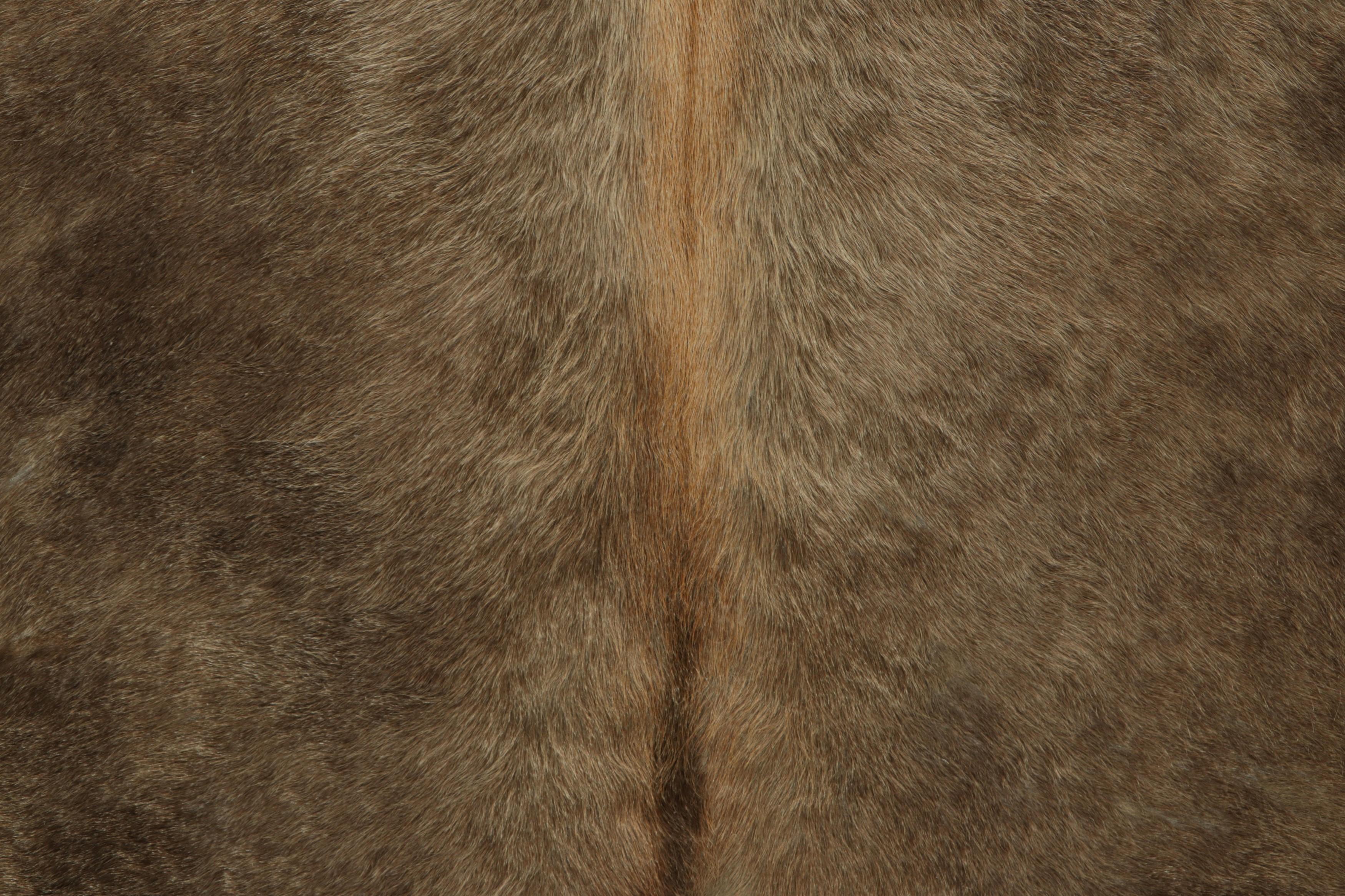 Modern Rug & Kilim’s Extra Large Cowhide Rug in Brown and White Tones For Sale