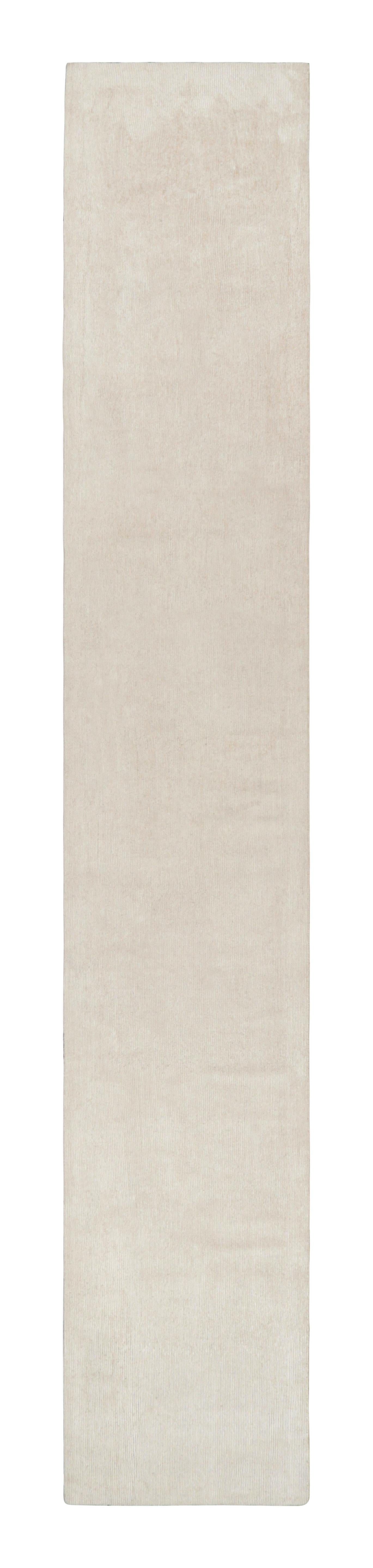 Hand-knotted in a luxurious blend of wool and silk, this extra-long 3x18 runner rug is a new addition to Rug & Kilim’s Textural Collection, and represents a new series of custom-capable contemporary designs. 

On the Design: 

This piece also