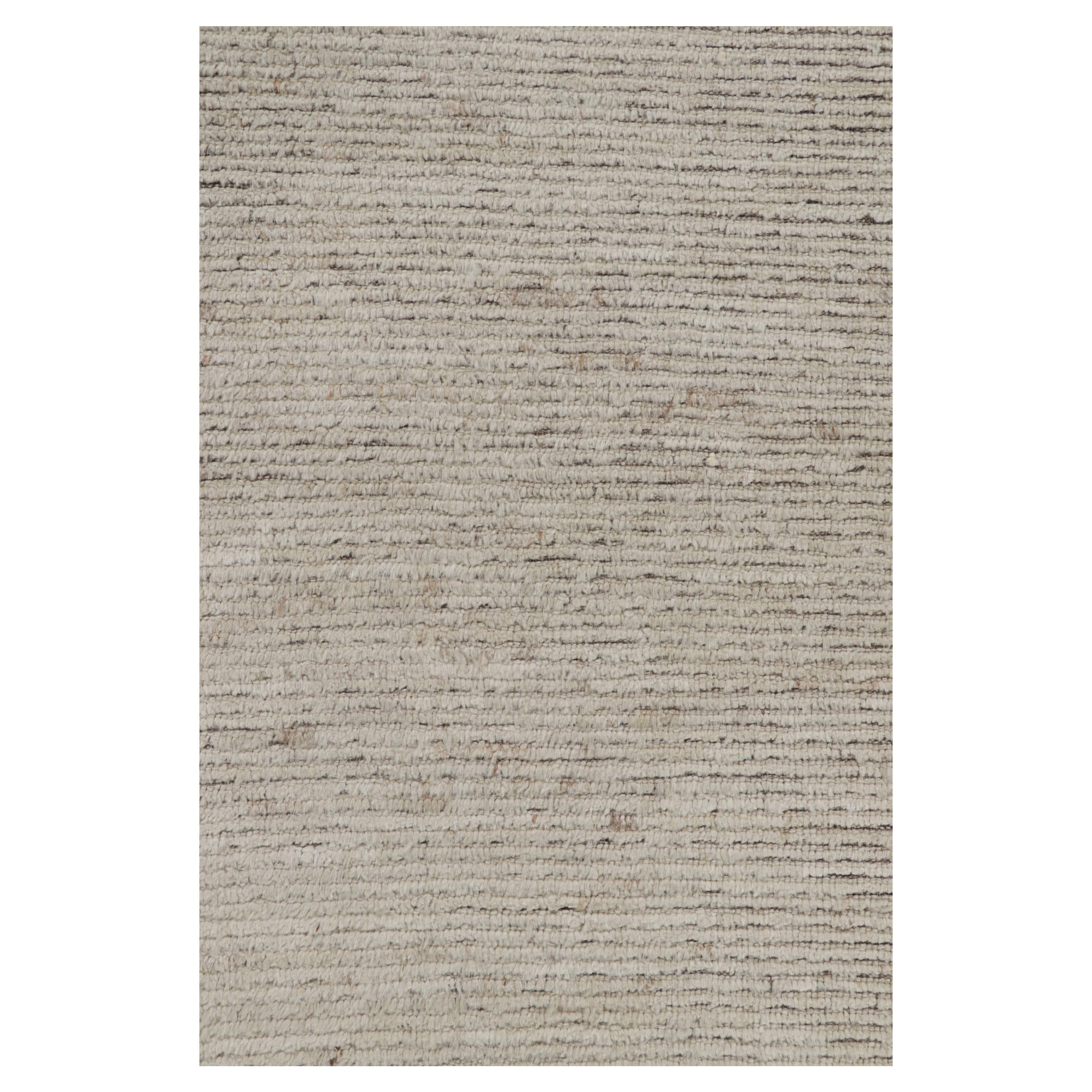 Tessuto a mano in lana, questo runner extra-lungo 3x20 è un'entusiasmante aggiunta alle collezioni di tappeti Modern e Textural di Rug & Kilim. Questa linea particolare presenta tappeti con un gioco di vello e trama piatta, con un sottile elemento