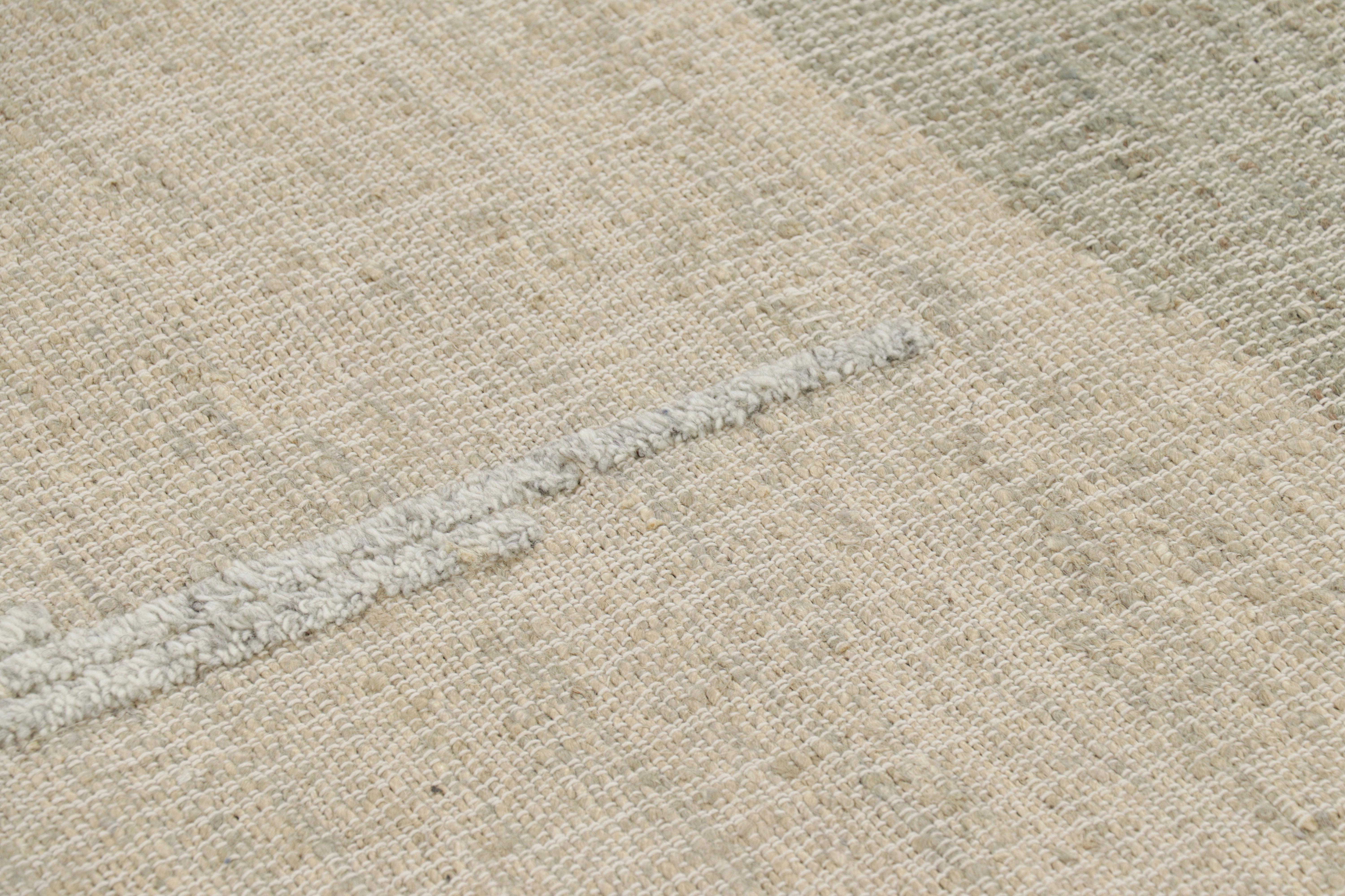 Made with handwoven wool and jute, this 6x8 contemporary flatweave rug by Rug & Kilim enjoys geometric patterns in beige-brown, green, blue-gray and white tones, and sustainable, all-natural materials—an exciting new custom-capable line.  

On the