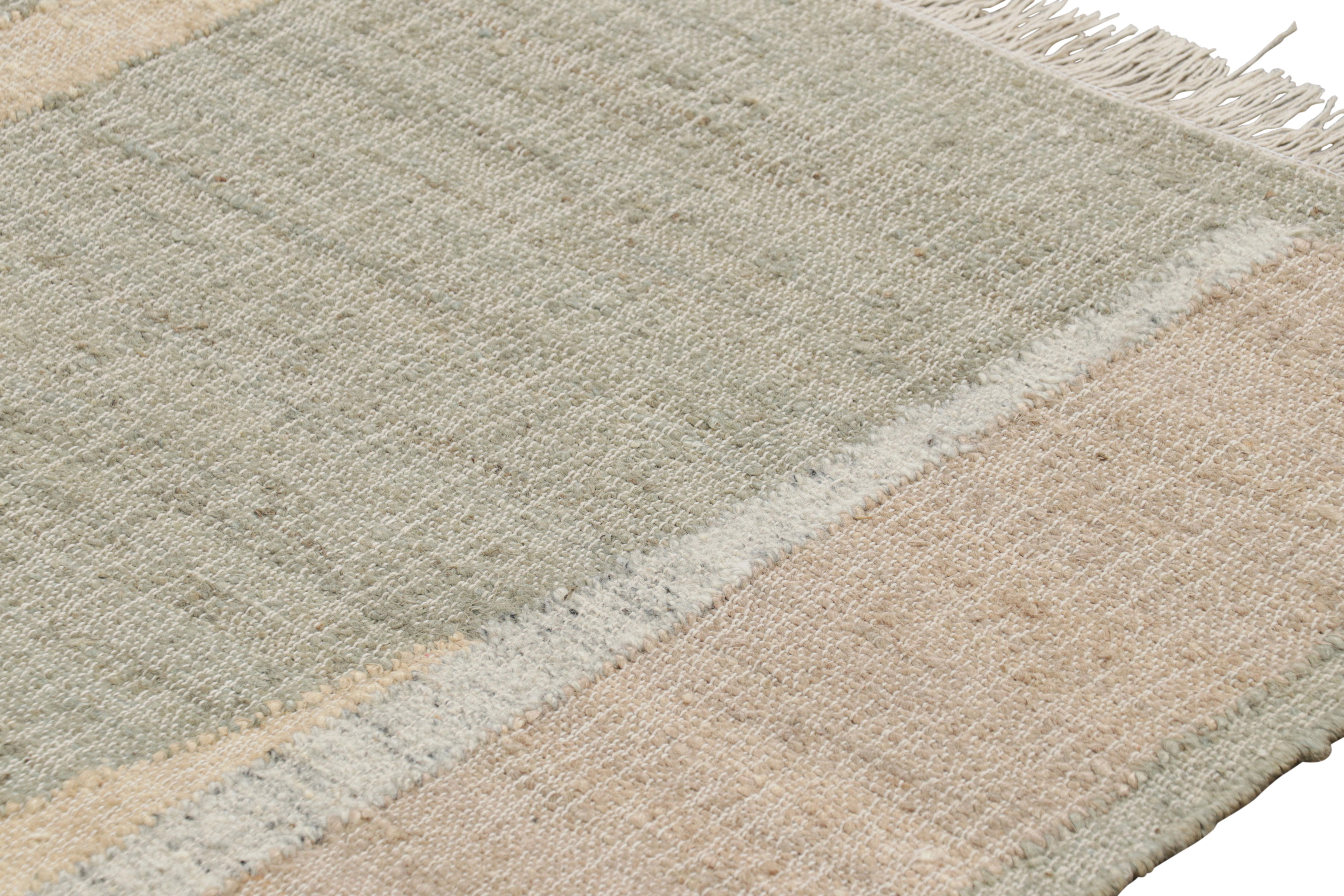 Made with handwoven wool and jute, this 7x8 contemporary flatweave rug by Rug & Kilim enjoys geometric patterns in beige-brown, green, gray and white tones, and sustainable, all-natural materials—an exciting new custom-capable line.  

On the