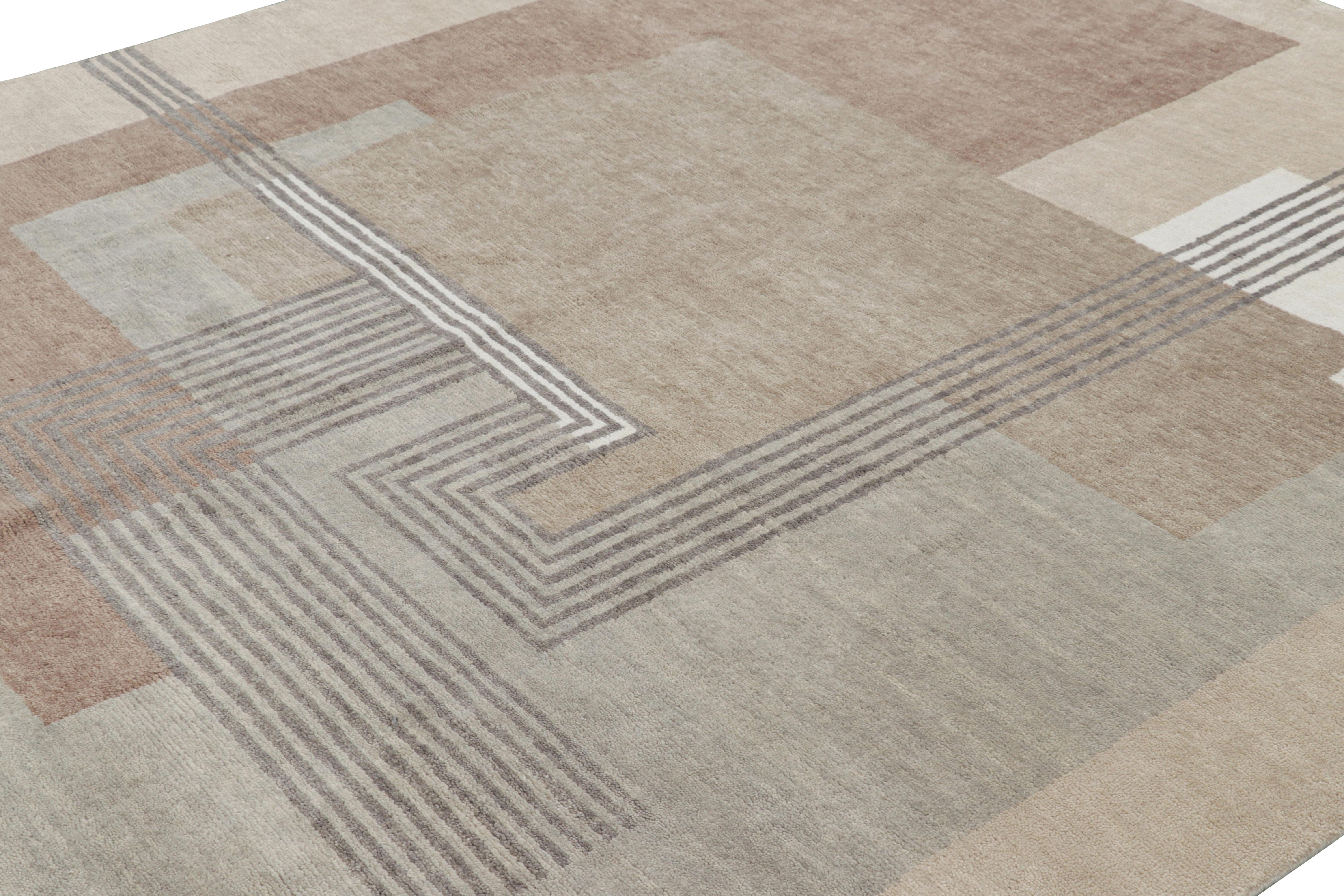 Hand-knotted in wool, this 8x10 rug by Rug & Kilim is a new addition to the French Art Deco rug collection—a contemporary ode to the 1920s style moderne, with geometric patterns in the style of a Leleu or Da Bruhns aesthetic period piece.

On the