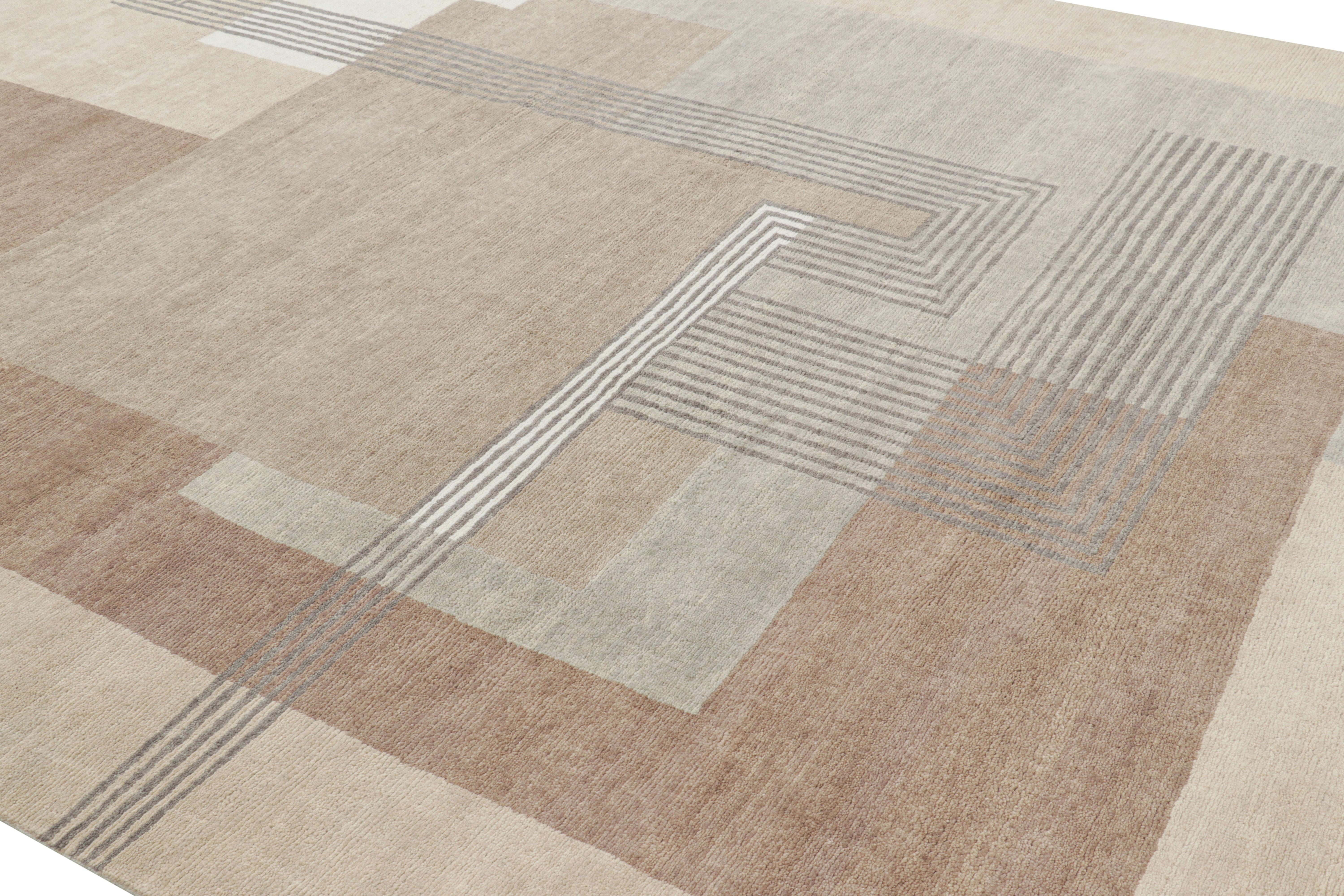 Hand-knotted in wool, this 9x12 rug by Rug & Kilim is a new addition to the French Art Deco rug collection—a contemporary ode to the 1920s style moderne, with geometric patterns in the style of a Leleu or Da Bruhns aesthetic period piece.

On the