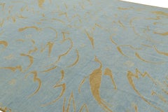 Rug & Kilim’s French Art Deco Rug in Blue with Curving Gold Patterns