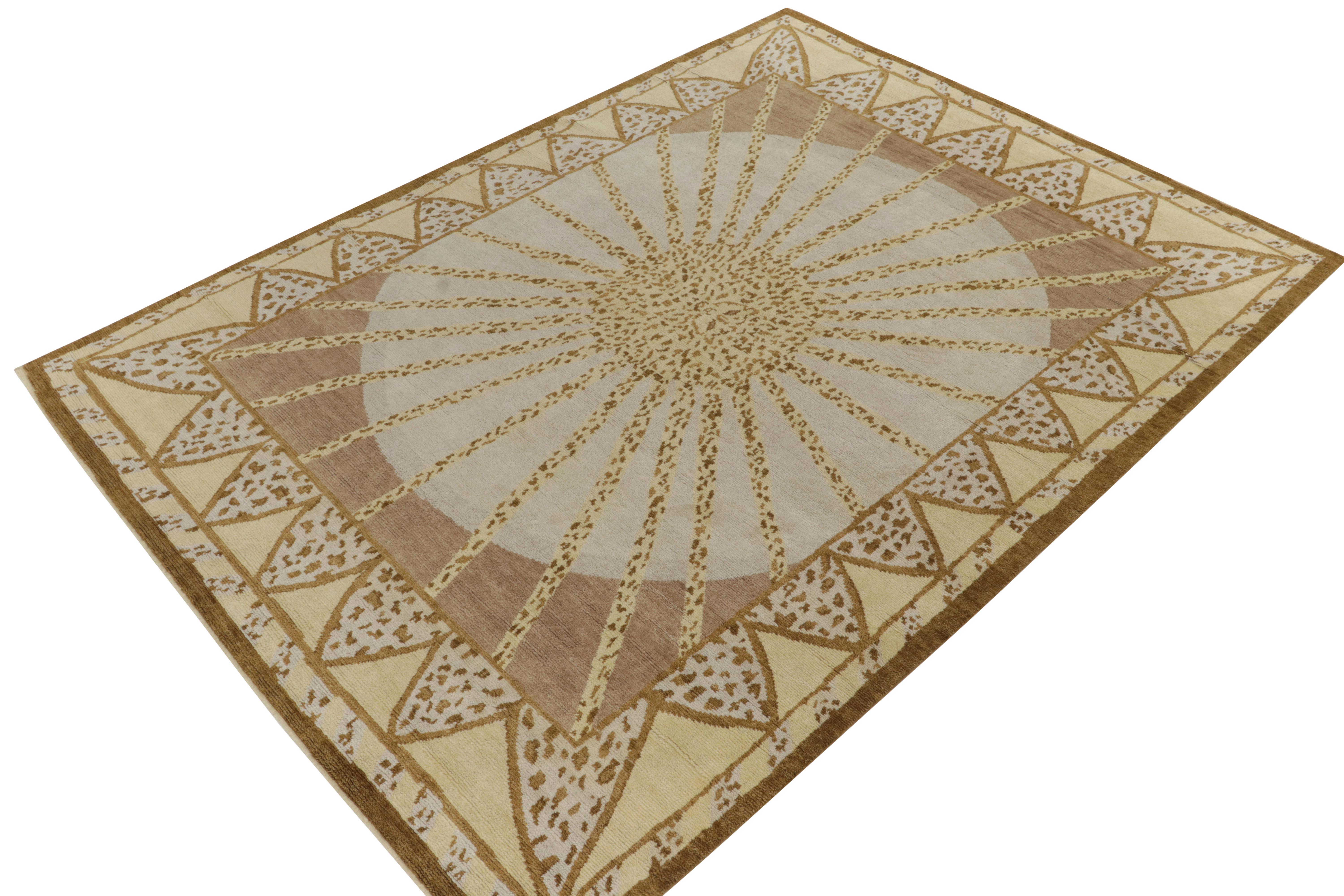 Hand-knotted in wool, a 9x12 ode to French Art Deco rugs, joining the inspired new Deco Collection by Rug & Kilim. Enjoying a geometric pattern like that of the rising sun in warm goldenrod & off white with beige-brown accents. An exemplar of our