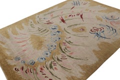 Rug & Kilim’s French Style Art Deco rug in Gold & Beige Patterns