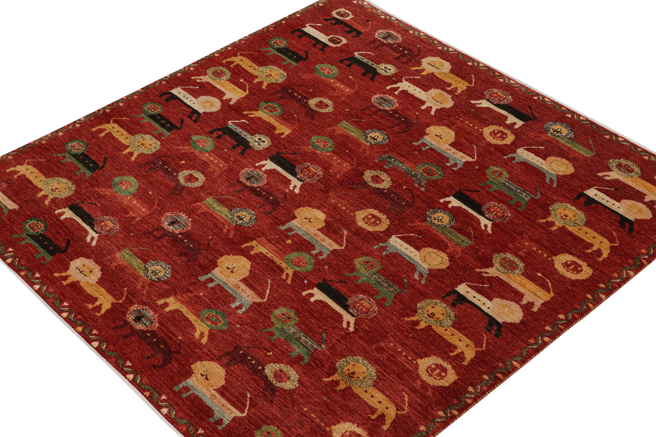 A 7x7 rug inspired by antique Persian Gabbeh rugs—from Rug & Kilim’s Modern Classics Collection. Hand-knotted in wool, it depicts a playful symphony of bright and rich lion pictorials on a red field background. 

Further On the Design:

The play