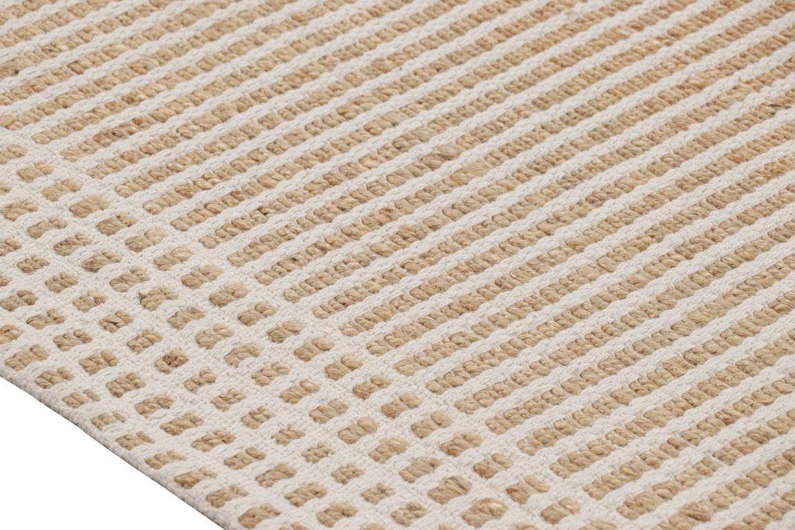 This 8x10 flatweave rug joins the modern and contemporary additions to the renowned Kilim & Flat Weave Collection from Rug & Kilim—hand woven in all-natural hemp with a marriage of forgiving, neutral beige and cream hues in a soothing striped