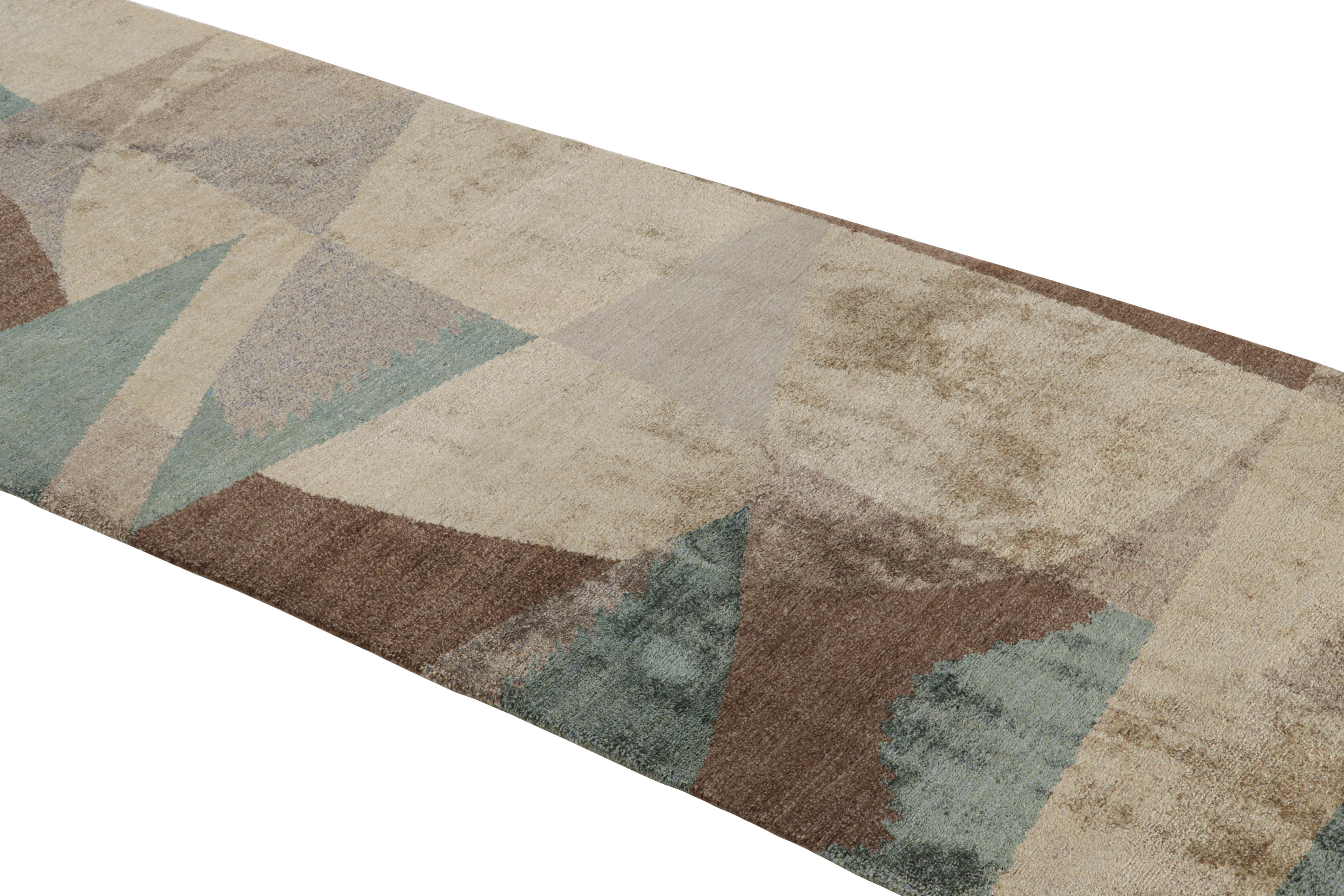 Hand-knotted in Nepal with high-quality wool and silk, this runner hosts a unique geometric 