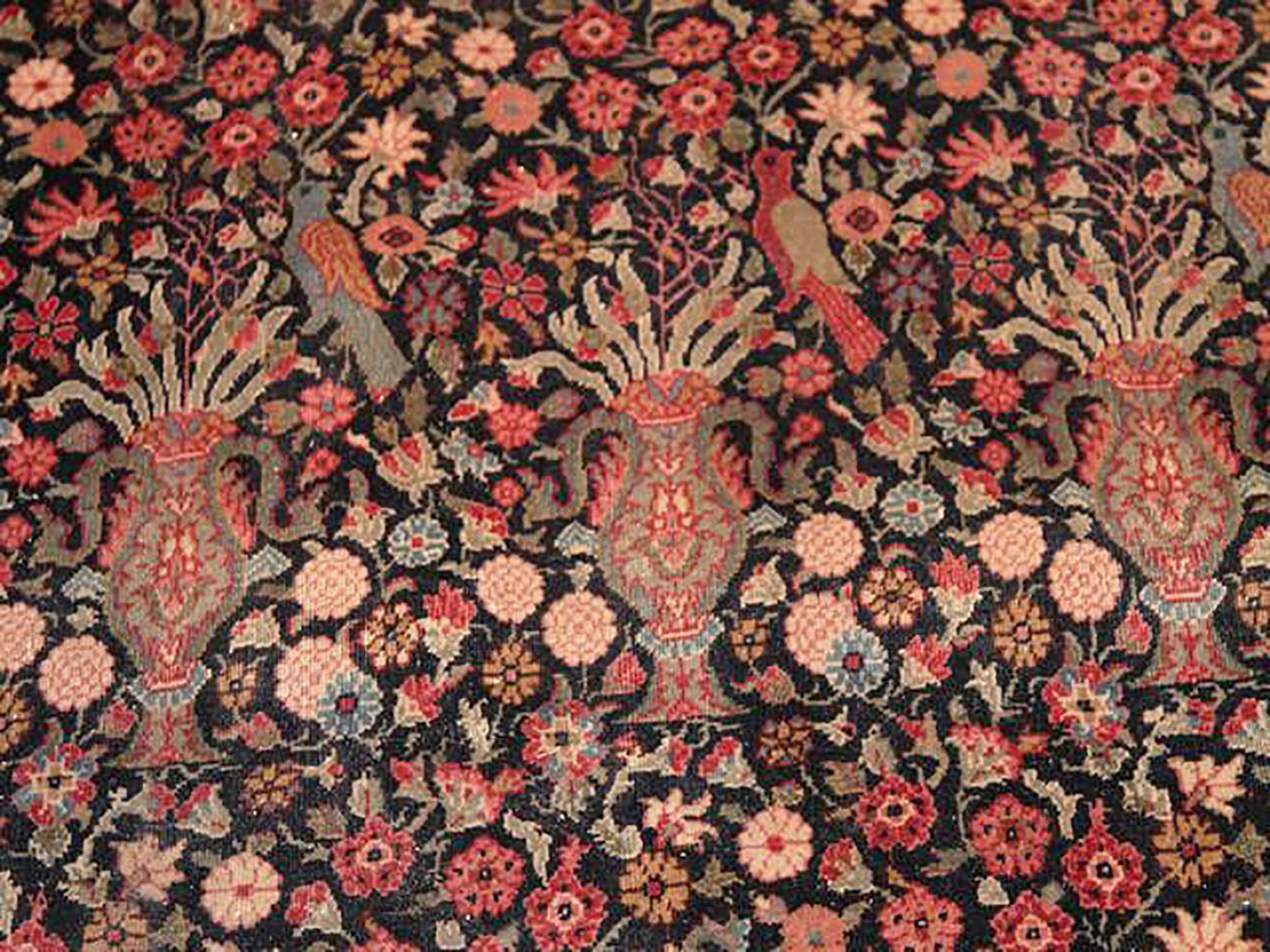 Hand knotted in wool originating from Turkey circa 1890-1900, this 10 x 16 antique rug connotes a unique large-size Sivas rug design of outstanding color and drawing, playing a variety of whimsied hues in a pictorial-meets-floral pattern above