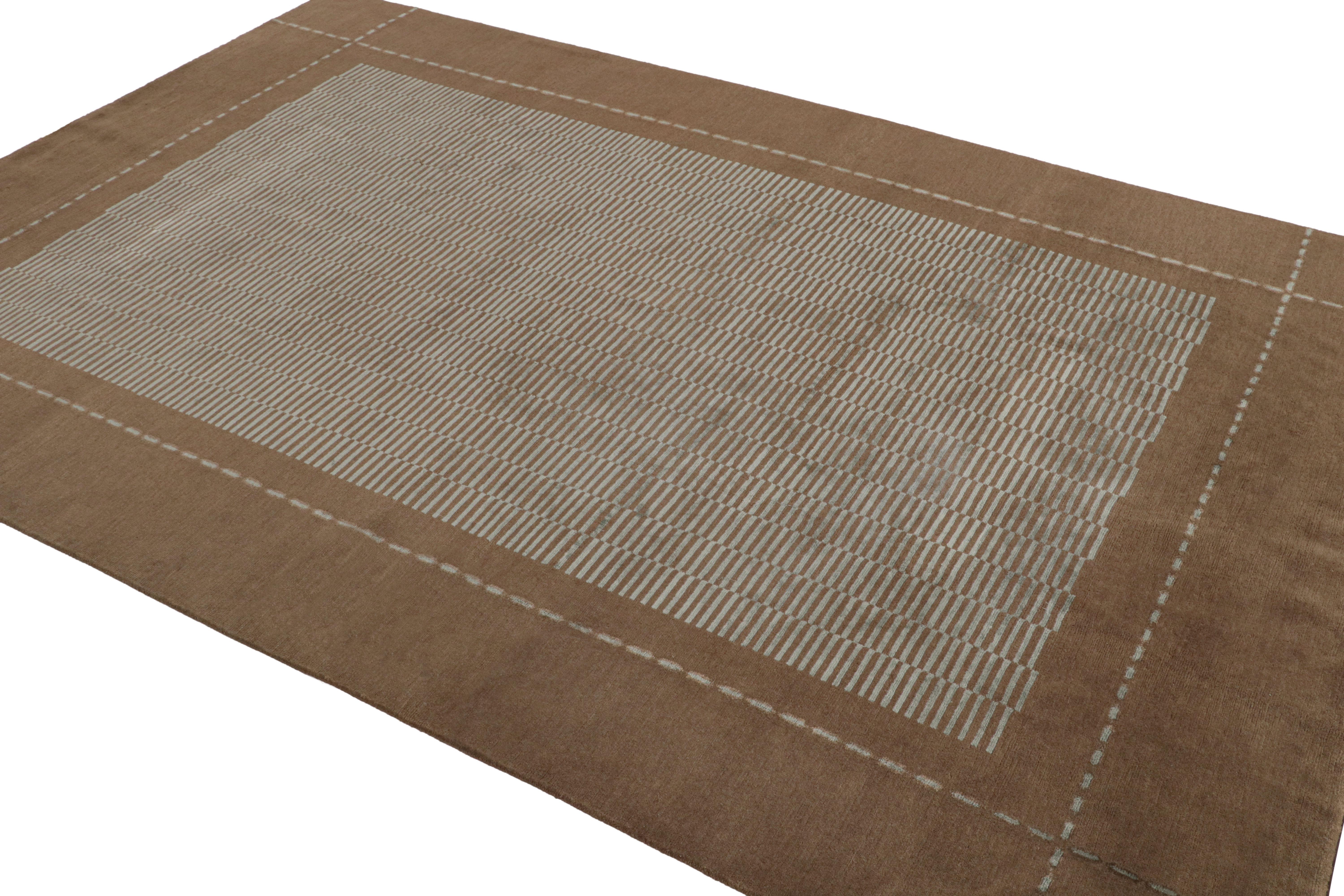 Annodato a mano in una miscela di lana e seta, questo tappeto Art Deco 6 x 9 fa parte della Collezione Europea di Rug & Kilim: si ispira allo stile dei tappeti Art Deco austriaci del movimento della Secessione, con una tonalità di blu