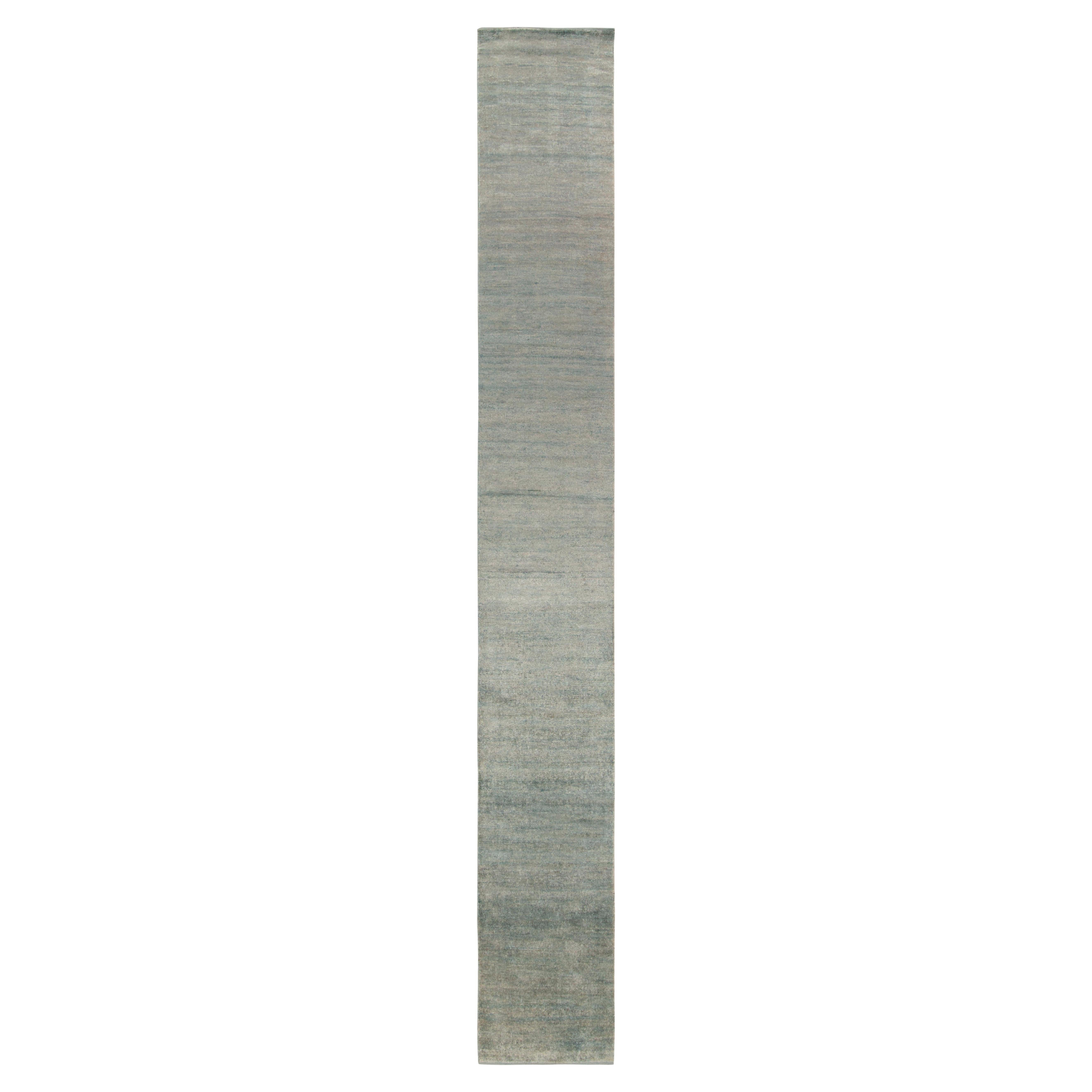 Rug & Kilim introduces its refined take on smart, yet simple modern rugs, from our Texture of Color collection. The 2x15 runner enjoys a cool colorway of silver-gray and blue striations—exemplifying the meticulous, subtly blended yarns achieving