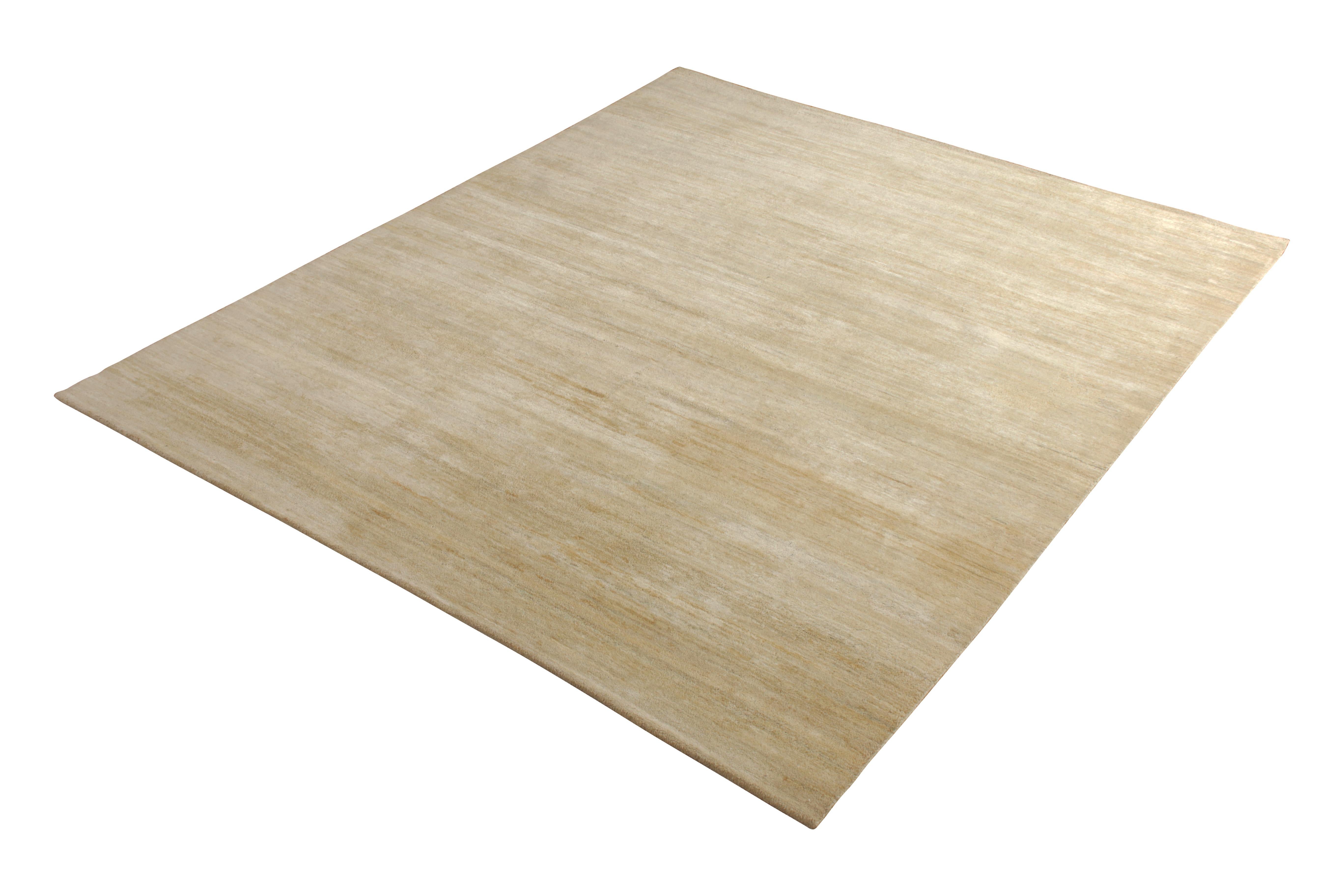 From Rug & Kilim’s Texture of Color collection, this contemporary rug innovates the concept of open field rugs and plain rug designs with subtle variations in color and craft. Made of luxurious hand knotted silk measuring 8 x 10, prevailing beige