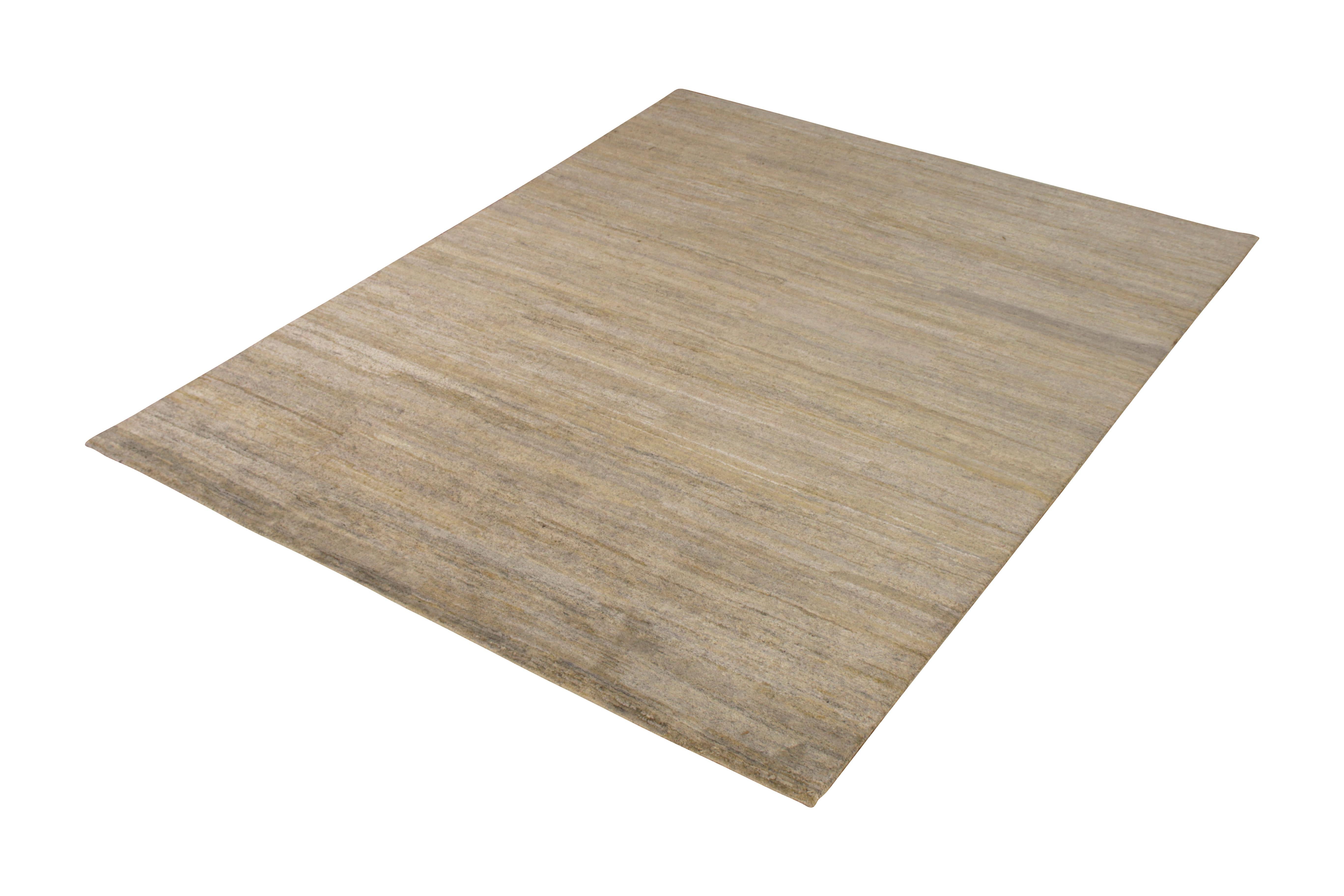 From Rug & Kilim’s texture of color collection, this contemporary rug innovates the concept of open field rugs and plain rug designs with subtle variations in color and Craft. Made of luxurious hand knotted silk measuring 8 x 10, prevailing gray and