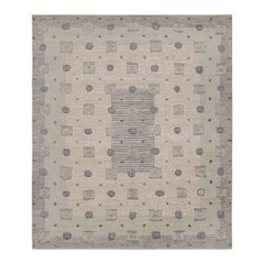 Rug & Kilim’s “High” Scandinavian Style Rug in Beige and Blue Geometric Pattern