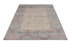 Rug & Kilim’s Ikats Style Distressed Rug in Beige and Blue Geometric Pattern