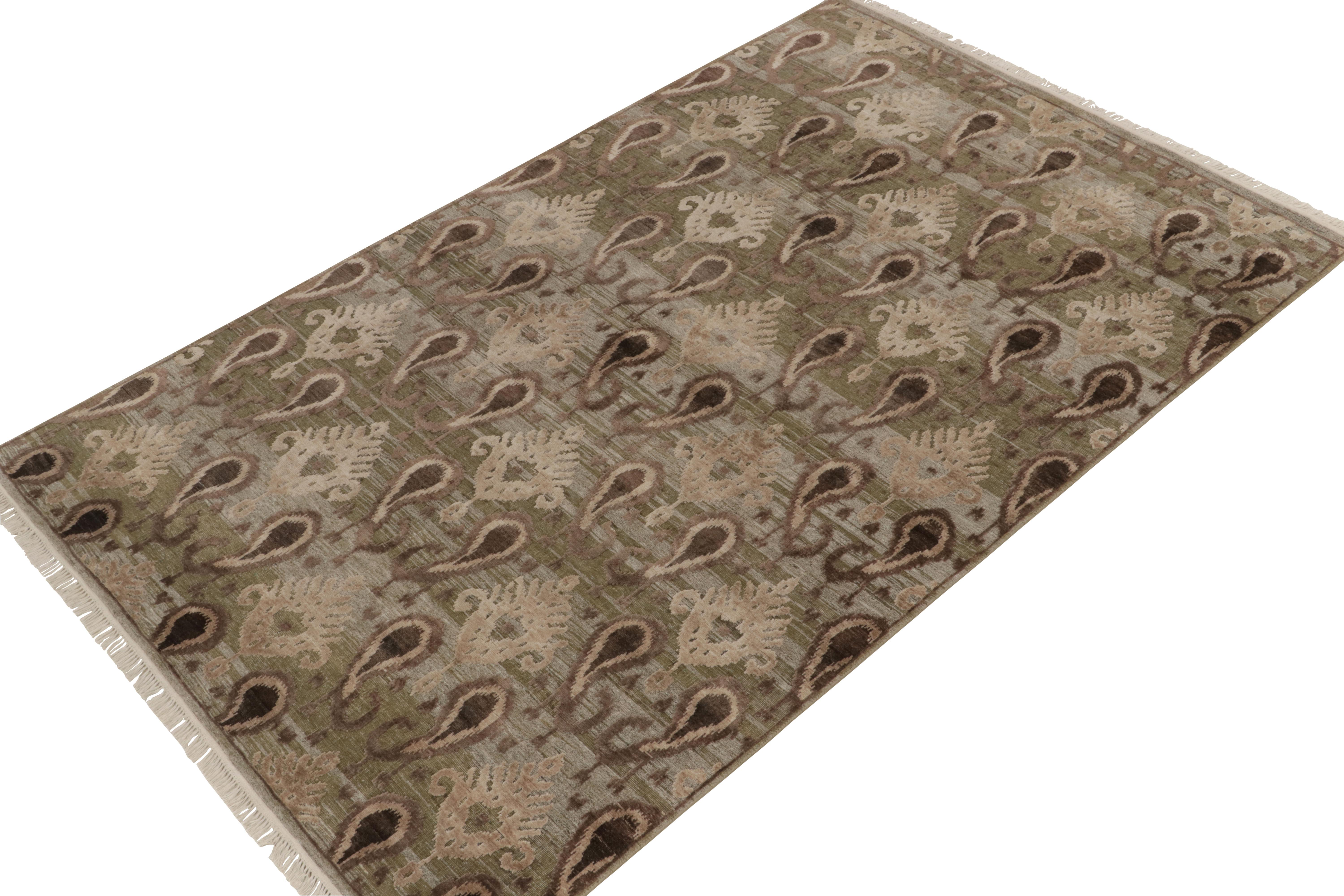 Handknotted in a fine blend of wool & silk, this 6x10 contemporary rug from our Modern Classics collection recaptures classic Ikats patterns celebrated in rugs and textiles for centuries. The traditional inspiration manifests in luscious green &