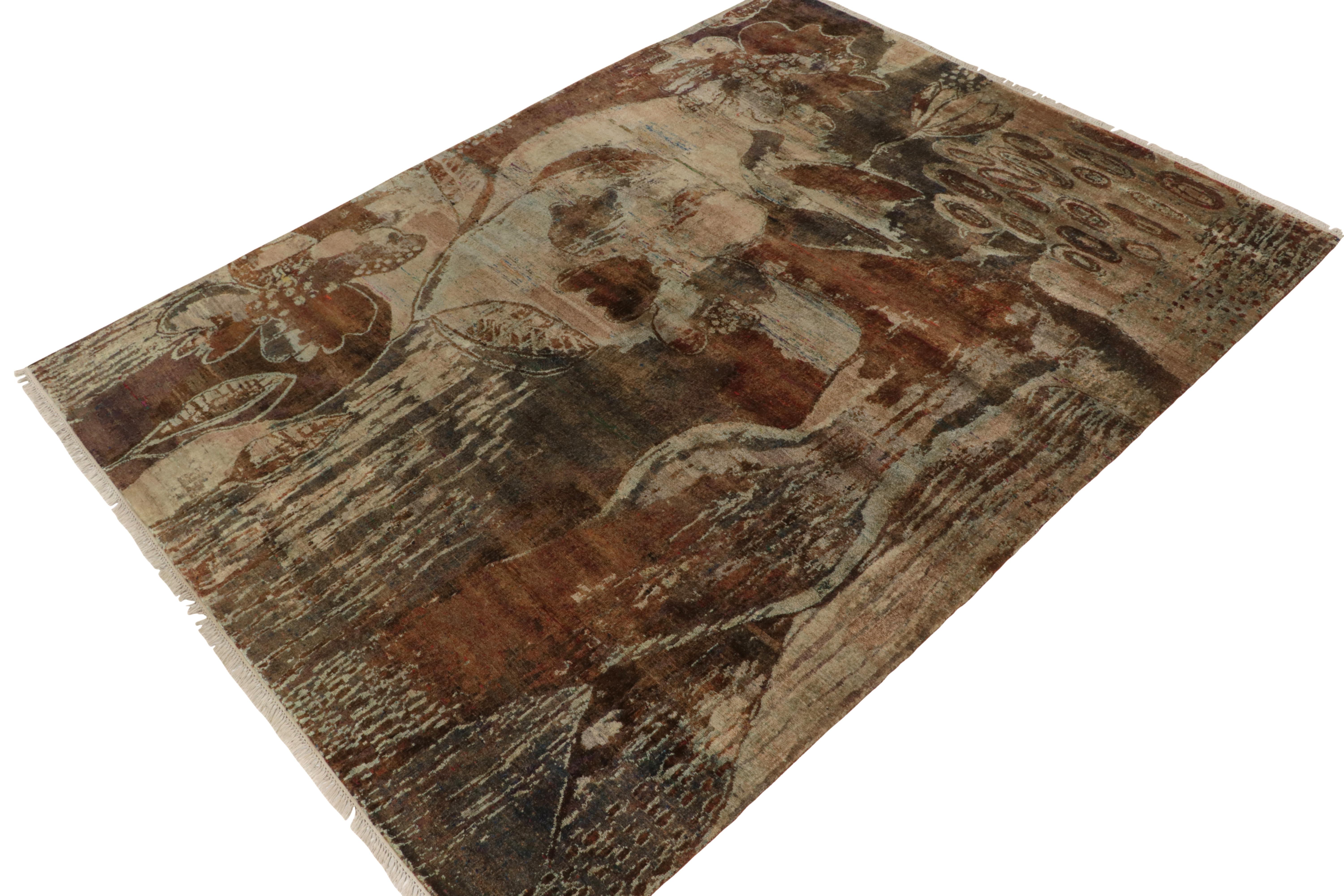 Hand-knotted in silk, this 9x12 from our Modern Classics collection is a bold contemporary piece, inspired by abstract-impressionist art. The thought-provoking drawing showcases rustic florals and painterly patterns in beige-brown with a variety of