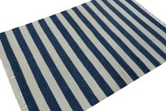 Rug & Kilim’s Indian Dhurrie Rug in Cool, Coastal Navy Blue and White Stripes